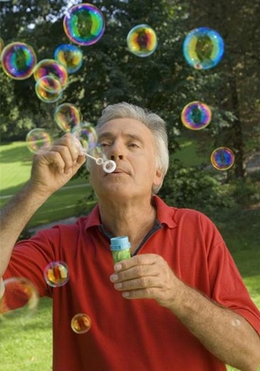 adult playing with bubbles